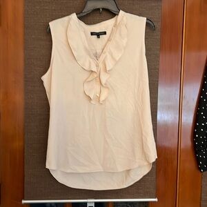 Supply demand woman’s blouse, medium sleeveless